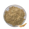 Ginseng powder in a clear glass dish with light beige botanical powder and a ginseng-like root beside it