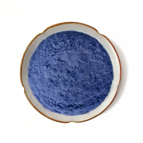 Butterfly pea flower powder in a top-view dish for botanical supplement and nutrition powder formulation