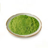 Matcha powder shown in an angled dish presentation for capsules, tablets, and botanical powder blend formulations