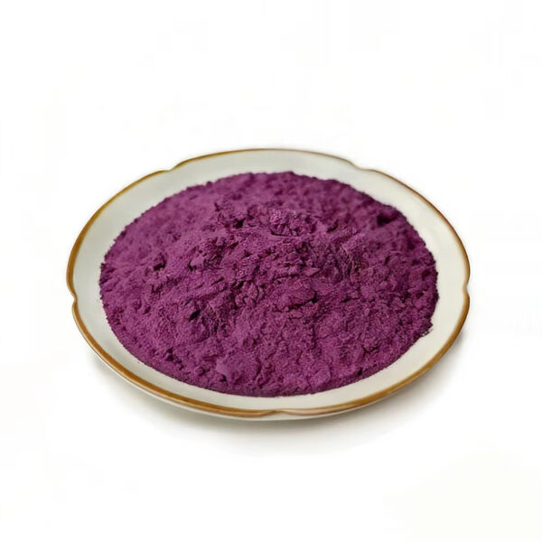 Fine purple sweet potato powder in a ceramic dish for beverage mix and nutrition powder formulation