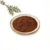 Brown shilajit powder in a shallow dish for nutrition powder and supplement formulation applications