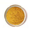 Turmeric root powder in a top-view dish presentation for botanical supplement and nutrition powder formulations