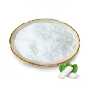 Xylitol powder with white chewing gum pieces and mint leaves for chewing gum and oral-care formulation