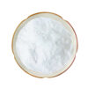 Top view of fine xylitol powder in a ceramic dish for functional food and powder blend formulation