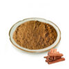 Cinnamon extract powder displayed in a ceramic dish with cinnamon sticks arranged in the lower corner
