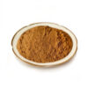 Fine brown grape seed powder in a shallow ceramic dish, presented for evaluation in capsule and tablet supplement formulations