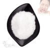Overhead view of white NHDC powder in a black dish with a chemical diagram and an inset showing tooth discomfort