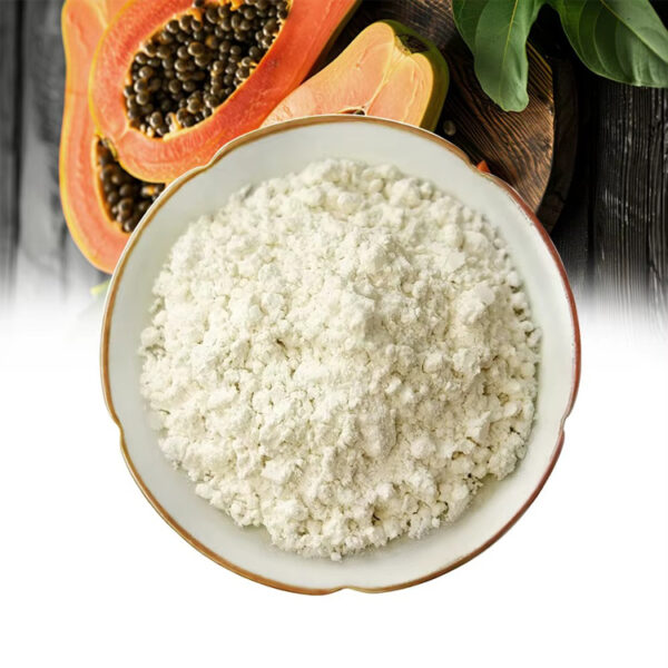 Overhead papaya extract powder presentation with cut papaya fruit, dark wooden background and green leaves