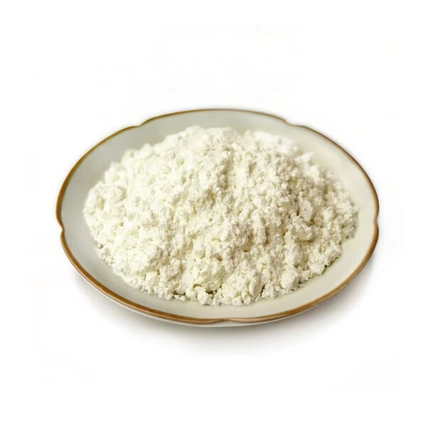 Side-angle view of pale cream papaya extract powder piled in a ceramic dish for botanical ingredient sourcing