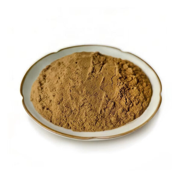 Angled view of fine tan-brown botanical extract powder heaped in a shallow ceramic dish