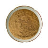 Top view of brown polygonum cuspidatum root extract powder in a round ceramic dish